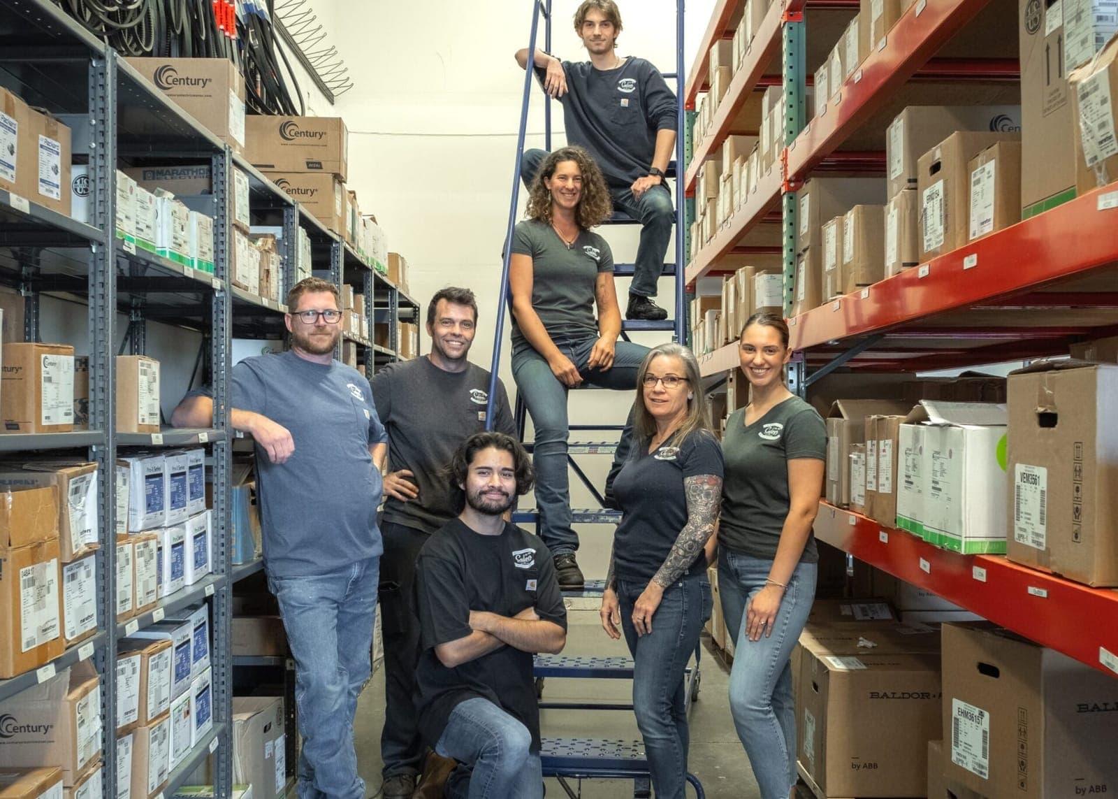 The Culver Pump & Motor team in the parts warehouse aisle